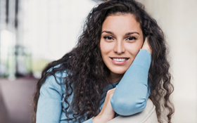 patient smiling after sinus augmentation from oral surgeon in Elgin, IL