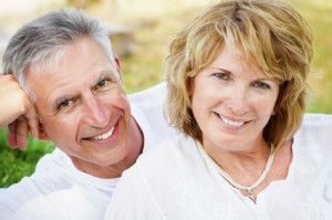 Elgin IL denture implants couple smiling