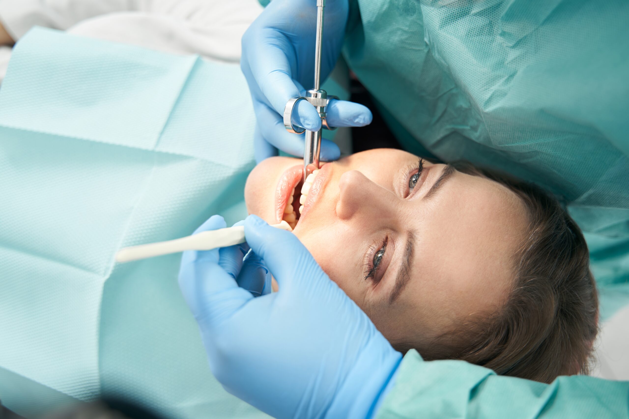 young woman undergoing a root canal procedure
