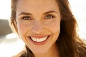 Smiling woman with proper occlusion.